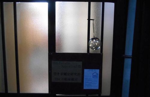 Minato Apartment | ペット可でUSJ まですぐ 木を基調としたログハウス調のお部屋