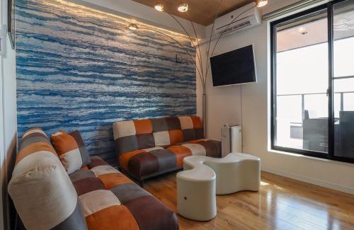 Yokosuka Apartment | ル グランブリュリゾート長沢 l テラスでゆったりオーシャンビュージャグジー 1棟貸切 小型犬可 無料駐車場付