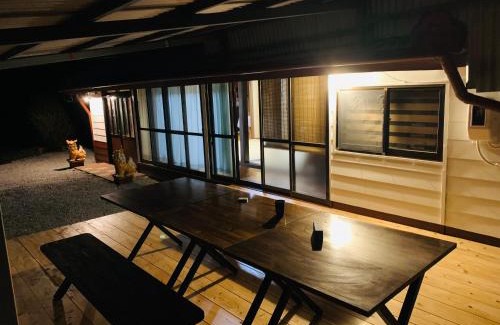 Nago House | 広い畳間と外には広いウッドデッキCondominium和風邸Yanbaru