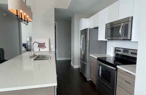 Garden Hills Condo | 1 Bed, 1 Bath Luxury High Rise Condo. Sleeps 4