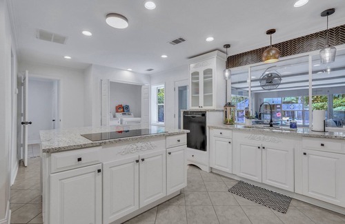 Savannah House | 10 ft pool house with tiki/bar hut, arcades games, and theater room-no parties