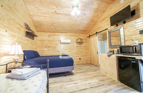 Ramer House | 1bd rm, 1 bth, hotel style cabin w/Mini fridge, micro, & tv, at Kick Back Ranch
