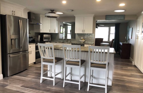 Port Richey House | 2/2 Canal Front w/10,000 covered boat lift and floating dock.