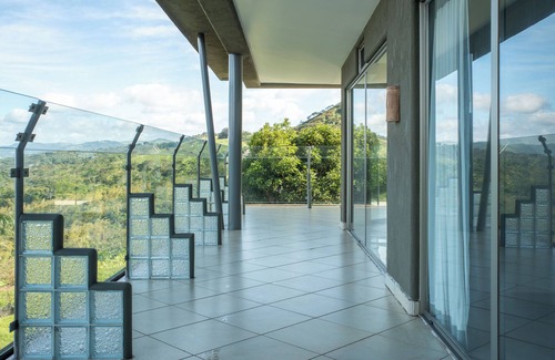 Tilaran Condo | 2-bedroom condo in marvelous Lake Arenal with WiFi, AC, swimming pool.