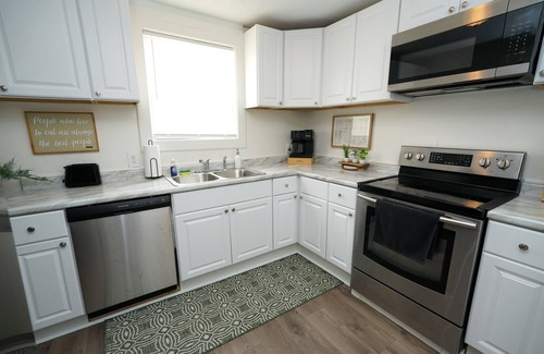 Elyria House | 2 homes- 7BR: Gather & Relax
