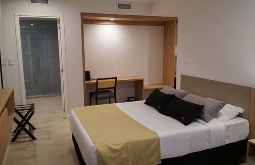Rio Cuarto Hotel | 2 Modern Rooms With Pool Free Breakfast And Parking Near Local Attractions