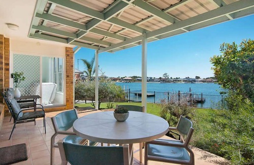 Yamba House | 21 MELALEUCA DRIVE, Waterfront with private boat ramp and pontoon -Pet Friendly