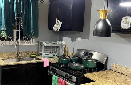 Spring Village House | 25 minutes from Kingston! Cozy Retreat in The Orchards, St. Catherine