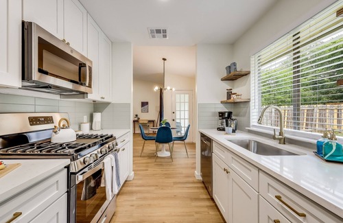 McNeil House | 2B/2B Fully Furnished w/Fenced Yard by Domain ATX