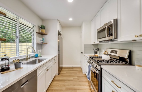 McNeil House | 2B/2B Fully Furnished w/Fenced Yard by Domain ATX