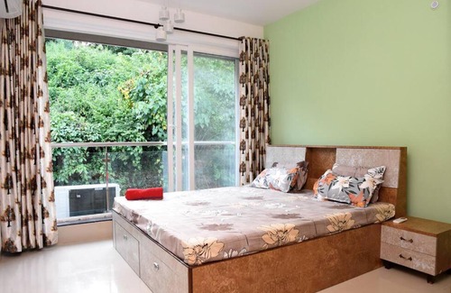 Bogmolo Apartment | 2BHK AC Apartment with Swimming pool close to beach and Airport!