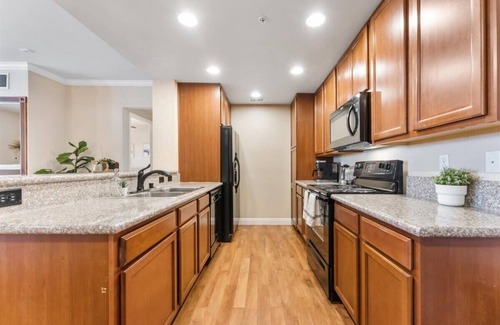 Reno/Tahoe Airport Apartment | 2BR Getaway Pool, Gym, Basketball Court & Theater Access