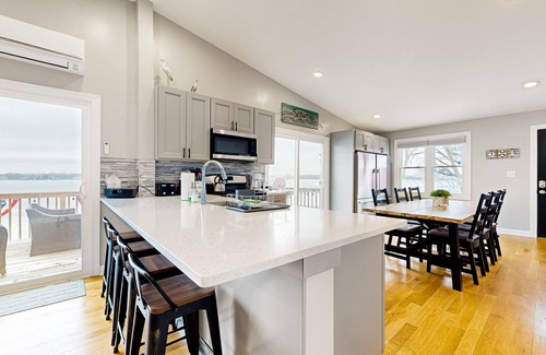 Channel Lake Apartment | 2nd-floor lakefront walk-up with firepit