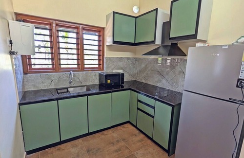 Mananthavady Villa | 3 BHK villa in wonderful Mananthavady with WiFi, AC and infinity swimming pool.