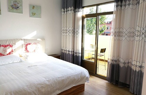 Shilin Yi Autonomous County House | 37 Garden Guesthouse Shilin Family