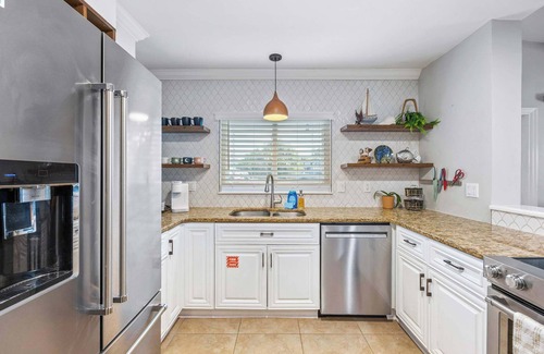West Point To Snug Harbor Estates House | 3BR Cocoa Beach Oasis w Tiki Hut & Kayaks (Walk to Beach!)