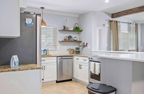 West Point To Snug Harbor Estates House | 3BR Cocoa Beach Oasis w Tiki Hut & Kayaks (Walk to Beach!)