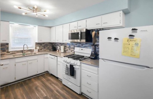 North Central Omaha House | 4 Bedroom, 2 Bath, Duplex, 4’ Fence, EV-Charger