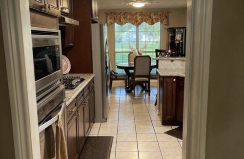 Port Arthur House | 4- Bedroom Serenity: 7 Beds Your Peaceful Retreat: Television in Every Bedroom