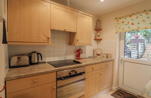 Charmouth House | 44 FERNHILL HEIGHTS, pet friendly, with a garden in Charmouth