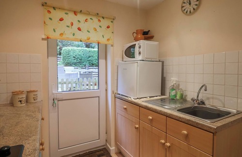 Charmouth House | 44 FERNHILL HEIGHTS, pet friendly, with a garden in Charmouth