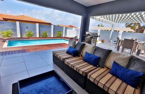 Malmok Villa | 46 seconds to BEACH, Pool side massages, Private chef, UTV, Gorgeous Villa