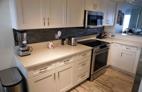 Seawinds Condo Condo | 5 STAR Direct Oceanfront Condo-ALL proceeds benefit physically handicapped child