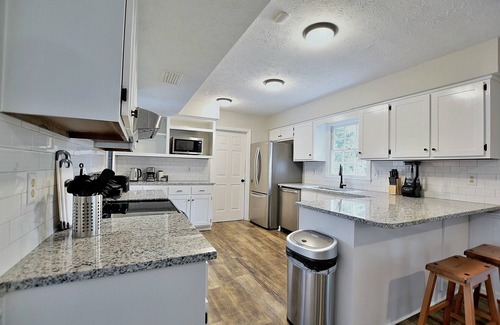 Fortson House | 5BR Spacious Retreat: Hot Tub, BBQ, Play Area