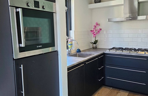 Ewijk House | 7 pers house -playground/room, fireplace, porch, close to lake & park facilities
