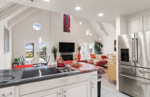 Brunswick House | 82 Palms - Waterfront Home & Rooftop Sun Deck