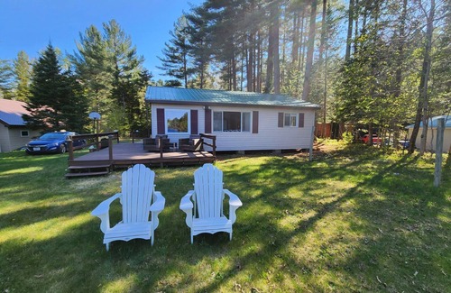 Woodgate Cottage | A beautiful cottage nestled in Adirondacks overlooking the peaceful White Lake