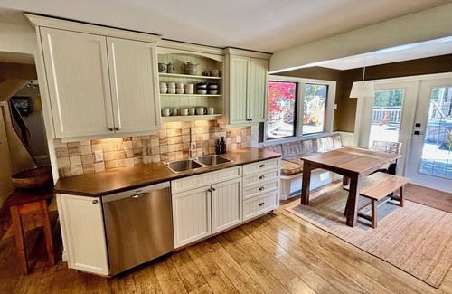 Courtenay House | A charming country home, nestled among fir trees. Close to the ocean.
