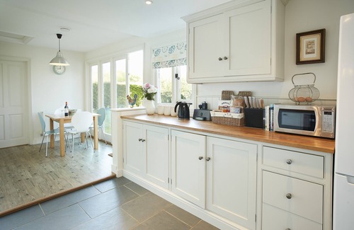 Wittersham Cottage | A charming, detached, weather-boarded cottage, set in a secluded location on the edge of the histori