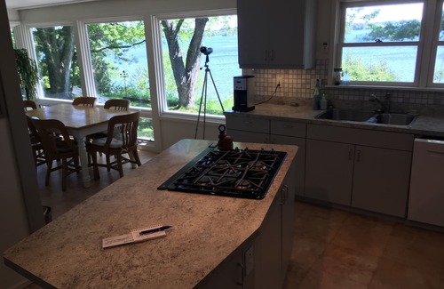 Eveleth House | A charming home on a beautiful peninsula on a crystal clear lake.