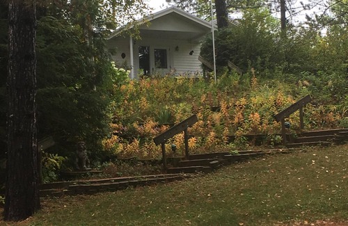 Eveleth House | A charming home on a beautiful peninsula on a crystal clear lake.