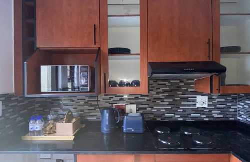 Greater Johannesburg Metropolitan Area Apartment | A cosy 2 bedrrom, 2 bath ground floor apartment with bistro, pizerria and bar