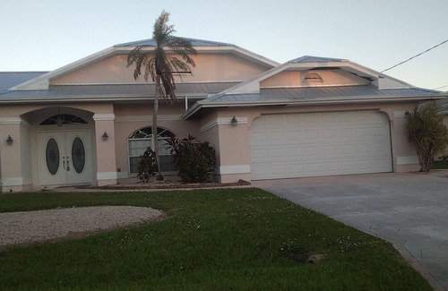 Gulf Cove House | A Piece of Heaven, Waterfront Home, Heated Screened Pool & in Port Charlotte