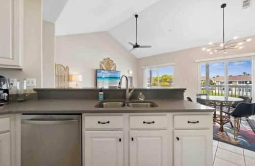Holiday Isle Condo | A Pop of Color 2BR 2Bath Golf Course and Canal View at Sandpiper Cove Destin FL!