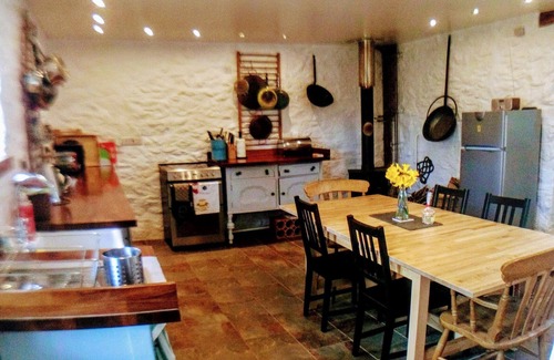Whitland Cottage | A spacious yet cosy eco converted dairy barn, situated within a vineyard.