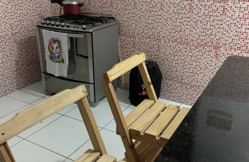 Araruama House | A street by the bus station, with air conditioning.