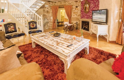 Cerdedo House | About 20 kilometers from the Ría de Pontevedra, this stone vacation home has been restored to offer
