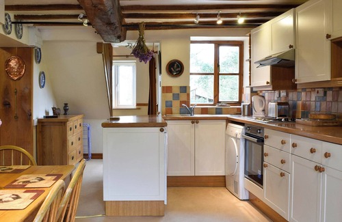 Tenbury Wells Cottage | Adorned with beams throughout.
