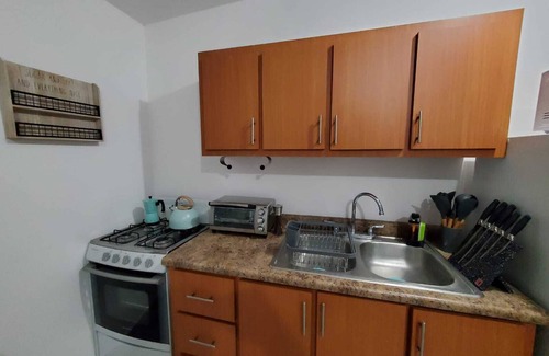 Aguadilla Apartment | Aguadilla Sunrise Apt with electricity water AC WIFI 8 minute walk to beach