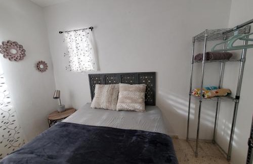 Borinquen Apartment | Aguadilla Surfers Lair apt with AC Wifi 8 minute walk to Crashboat beach
