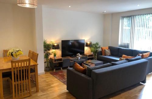 Brent Apartment | Aisiki Stays Apartments at Queensbury, Ground Floor, 2-Bedroom and 2-Bathroom, King or Twin Beds with Front Porch, Free Wi-Fi & Parking Space