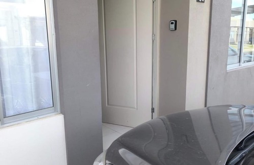 Guacima House | Alajuela Stay: Close to Airport, Viva Park & CAR with amenities like pool & gym