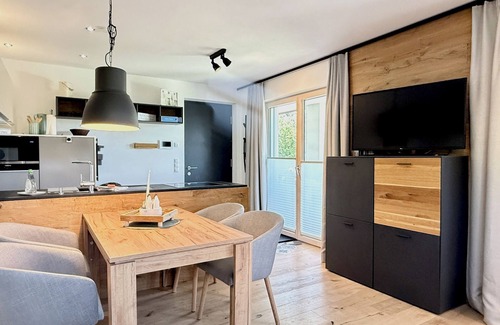 Scheidegg Apartment | Allgäutraum vacation apartment - bright, high-quality, with whirlpool bath and wood-burning stove