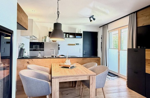 Scheidegg Apartment | Allgäutraum vacation apartment - bright, high-quality, with whirlpool bath and wood-burning stove