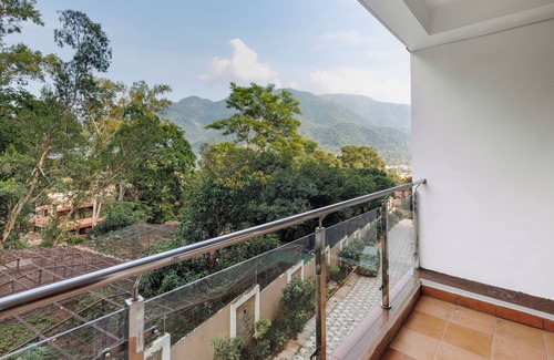 Rishikesh Apartment | Amalia House | Family-sized condo with cozy modern interiors