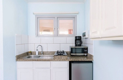 Boegoeroei Apartment | Amazing 2BR 1BA w/Pool~ Close to the Beach ~ BBQ!